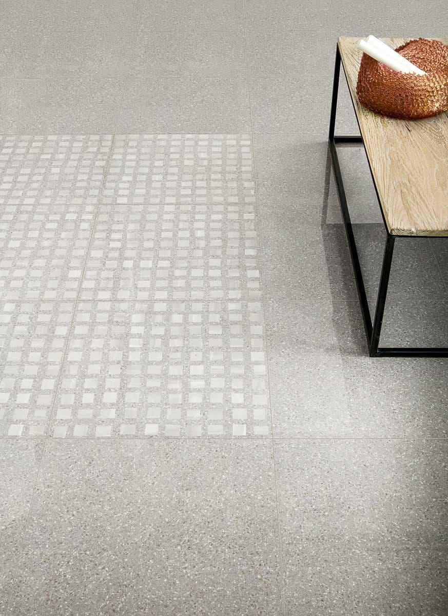 Détail d'un sol en granito avec granulats de marbre